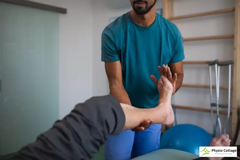 Physiotherapist treating a refugee patient at Physio Cottage in Scarborough