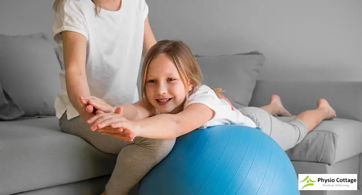 Young girl while performing an exercise, reflecting physiotherapy early years support.