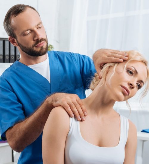 portrait-of-chiropractor-stretching-neck-of-woman-during-appointment-in-hospital.jpg portrait-of-chiropractor-stretching-neck-of-woman-during-appointment-in-hospital.jpg